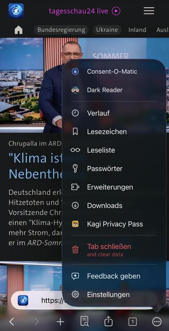 Menu overlay with options like Dark Reader, Downloads, and Settings on a mobile browser interface.